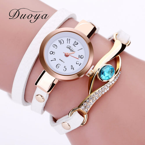 Women Luxury Gold Eye Gemstone Dress Watches