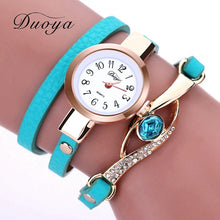Women Luxury Gold Eye Gemstone Dress Watches